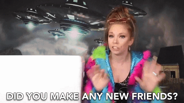 a woman in a colorful outfit says did you make any new friends .