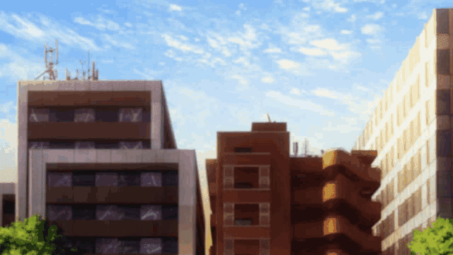 a few buildings with antennas on top of them and a blue sky in the background