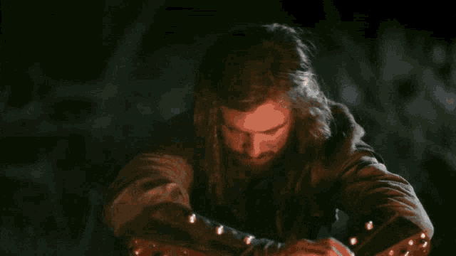 a man with a beard says he turned into a goblin in a dark room