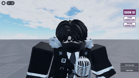a person in a video game is holding a microphone and a stop animation and pause animation button