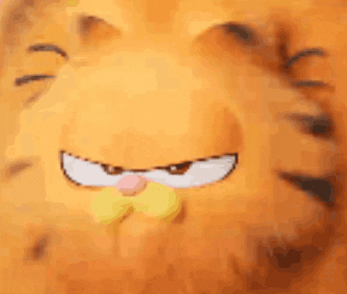 a close up of garfield 's face with a yellow nose
