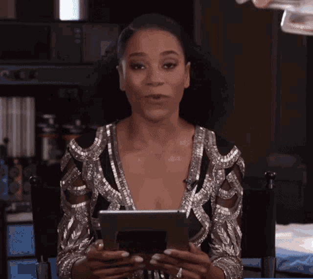 Kelly Mccreary Tablet GIF - Kelly Mccreary Tablet Look Up GIFs