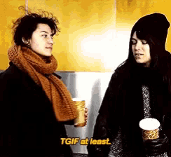 two women standing next to each other with tgif at least written on the bottom