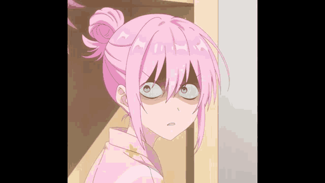 a girl with pink hair and blue eyes is making a funny face