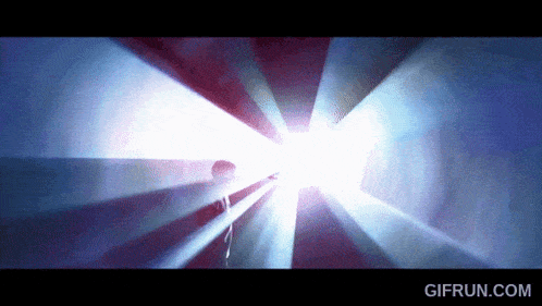 a gif from gifrun.com shows a light coming out of a dark room