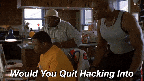 a man sitting in front of a computer with the words " would you quit hacking into " above him