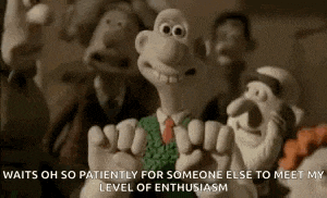 a group of cartoon characters are standing next to each other in a room holding hands .