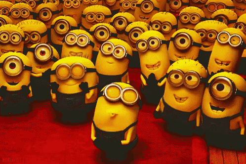 a bunch of minions are standing on a red floor