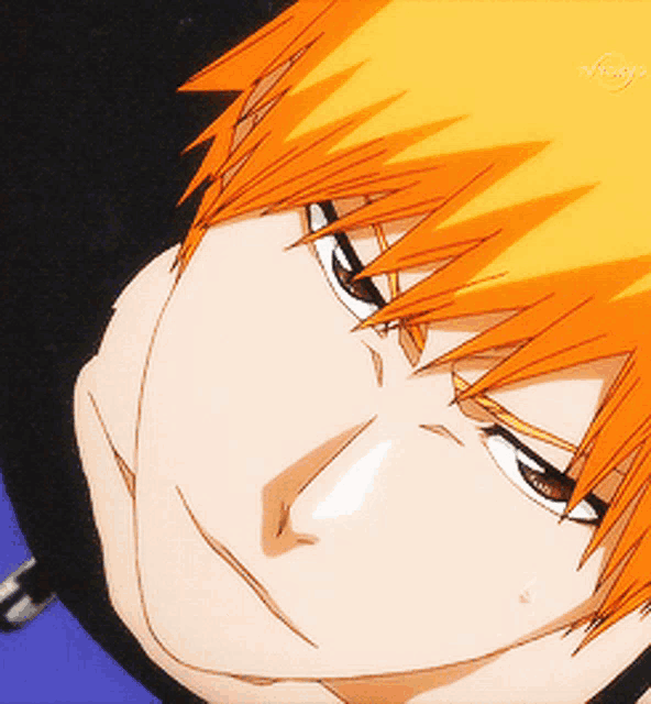 a close up of a person 's face with a tv tokyo logo in the background