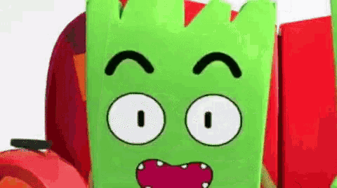 a close up of a cartoon character 's face with a surprised look on his face .