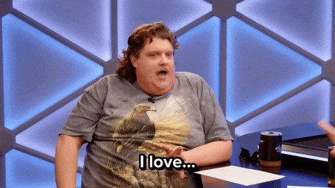 a man wearing a shirt with an eagle on it says " i love "