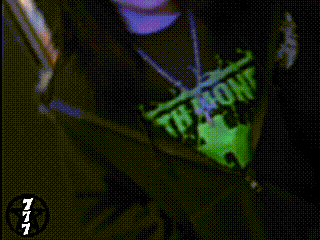 a woman 's face is shown with a pentagram on the bottom right