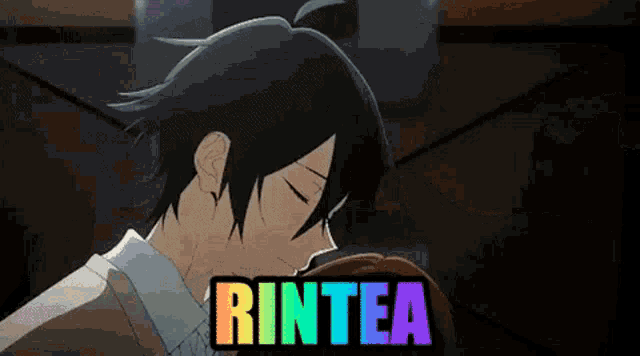 a man and a woman are kissing and the word rintea is visible in the corner .
