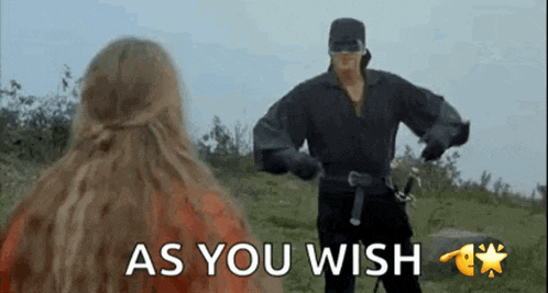 a man with a sword standing next to a woman with the words as you wish written on the bottom
