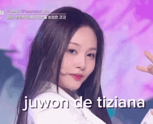 a close up of a woman 's face with the words juwon de tiziana written above her .
