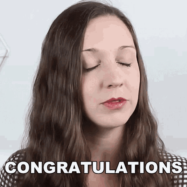 a woman with her eyes closed and the words congratulations on her face