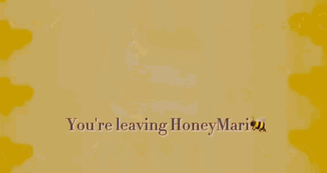 a person is wearing a bee costume and a mask .