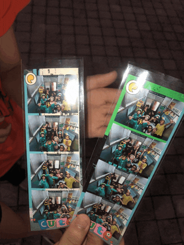 a person is holding two photo strips with the word cute on them