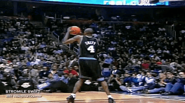 a basketball player named stromile swift is jumping for the ball