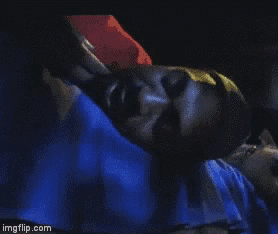 a person laying on a bed with a blue blanket with imgflip.com written on the bottom