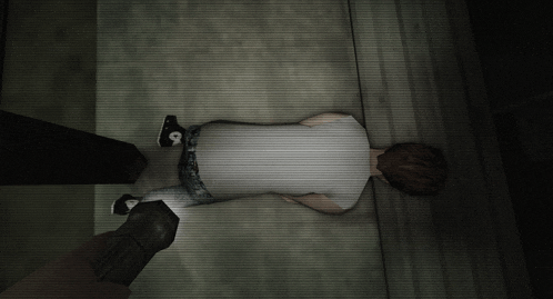 a person laying on the floor with a white shirt that has the letter o on it