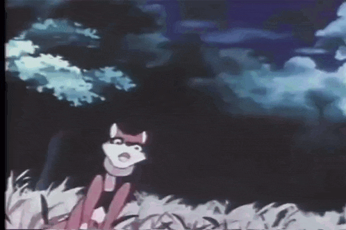 a cartoon cat is standing in the grass in the dark .