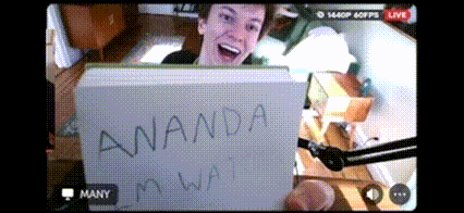 a video of a man holding a sign that says " amanda my way "