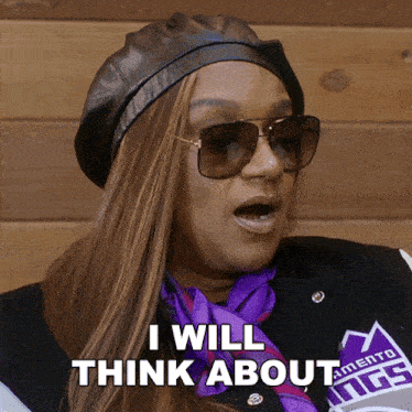 a woman wearing sunglasses and a purple scarf says i will think about