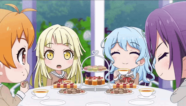 a group of anime girls are sitting around a table with cupcakes and tea cups