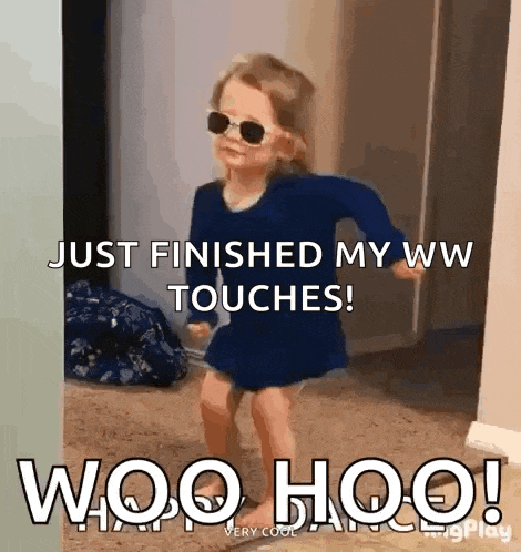 a little girl wearing sunglasses and a blue dress is dancing in a room .