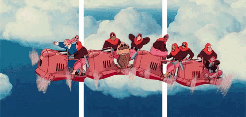a group of people are riding a red airplane in the sky