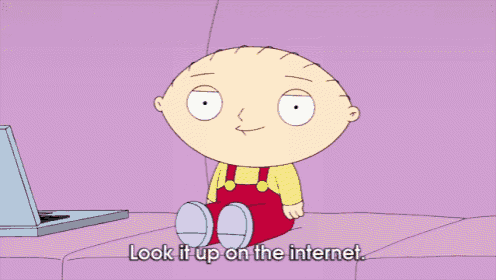 a cartoon character sitting on a couch pointing to the internet