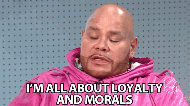 a bald man in a pink jacket is saying i 'm all about loyalty and morals