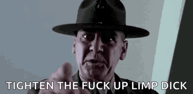 a man in a military uniform and hat is pointing at the camera and says `` tighten the fuck up limp dick '' .
