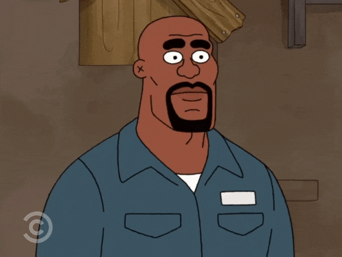 a cartoon of a man with a beard wearing a blue shirt with the letter c on the bottom right
