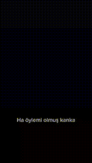 a person in a red jacket is walking in a room with the words ha eylemi olmus kanka written on the floor