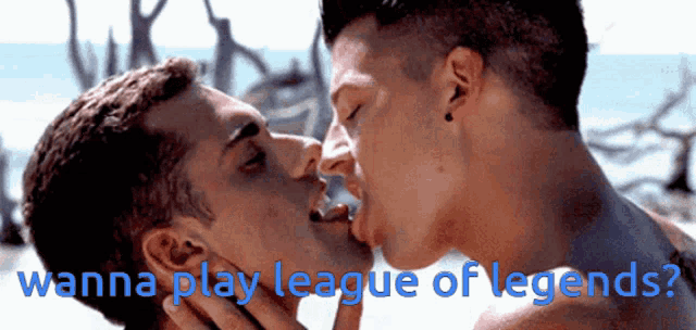 a couple of men kissing with the words wanna play league of legends