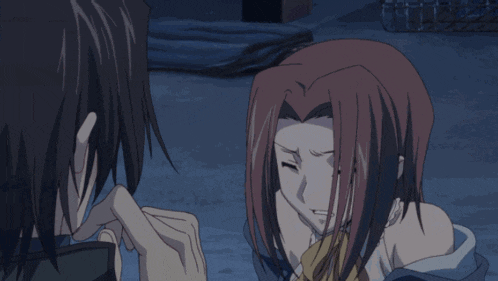a man is touching a woman 's face in a cartoon
