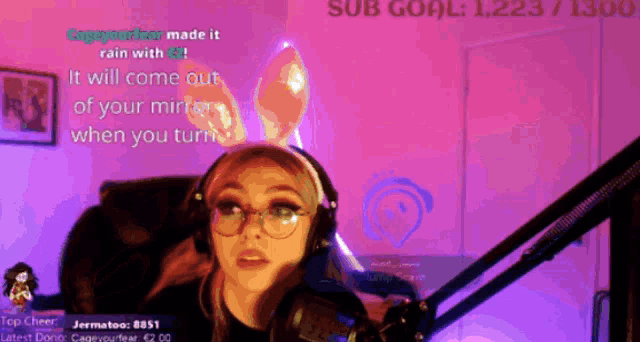 a woman wearing bunny ears is on a twitch stream