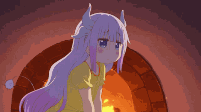 a girl with horns is standing in front of a fire
