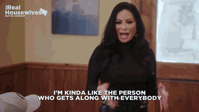 a woman says " i 'm kinda like the person who gets along with everybody " in a video