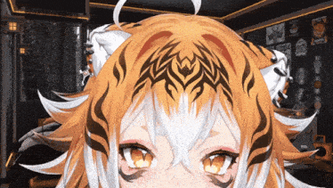 a close up of a tiger 's head with a tribal tattoo on it
