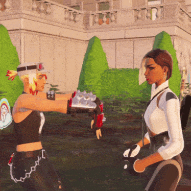 two women are standing next to each other and one has spiked gloves