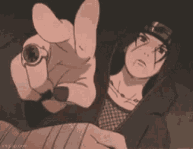 itachi uchiha from naruto is pointing at the camera with his hand .