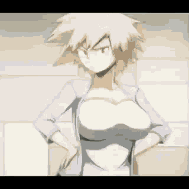 a woman with a large breast is standing with her hands on her hips in a room .