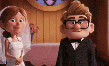 a bride and groom are standing next to each other in a room .