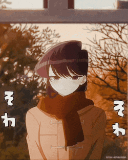 a girl wearing a scarf and a beret stands in front of a tree