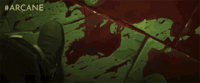 a green and red background with the word arcane on it