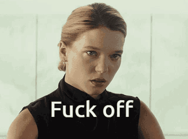 a close up of a woman 's face with the words fuck off below her