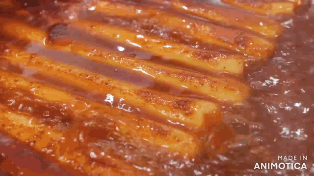 a tray of food with the words made in animotica on the bottom right